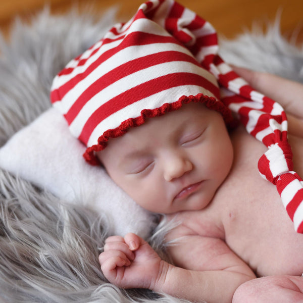 Red and cheap white baby hat